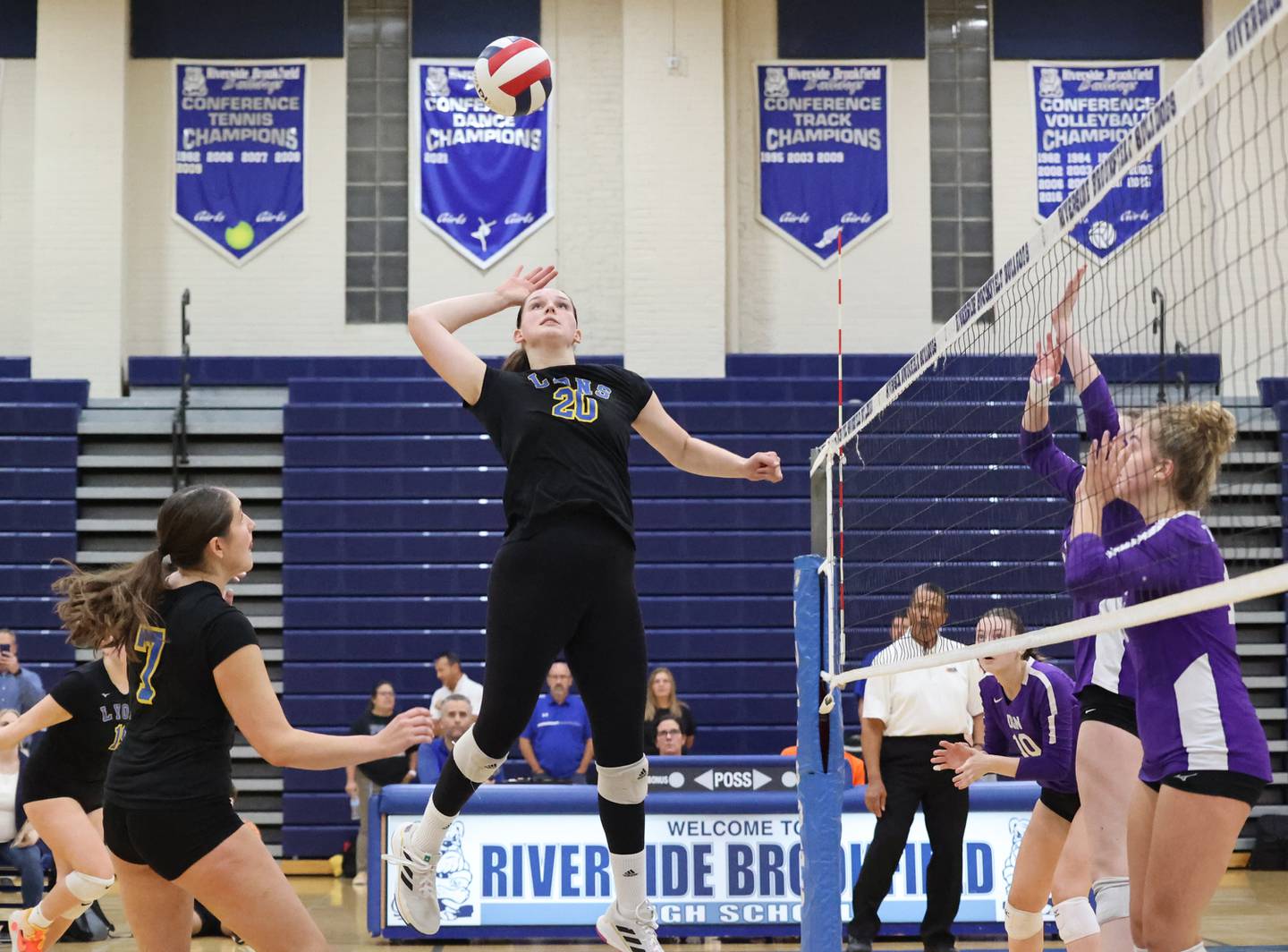 Lyons’ Grace Turner (20) goes for a kill against Downers Grove North during the 4A girls varsity volleyball regional final match at Riverside Brookfield high school on Thursday, Oct. 26, 2023 in Riverside, IL.