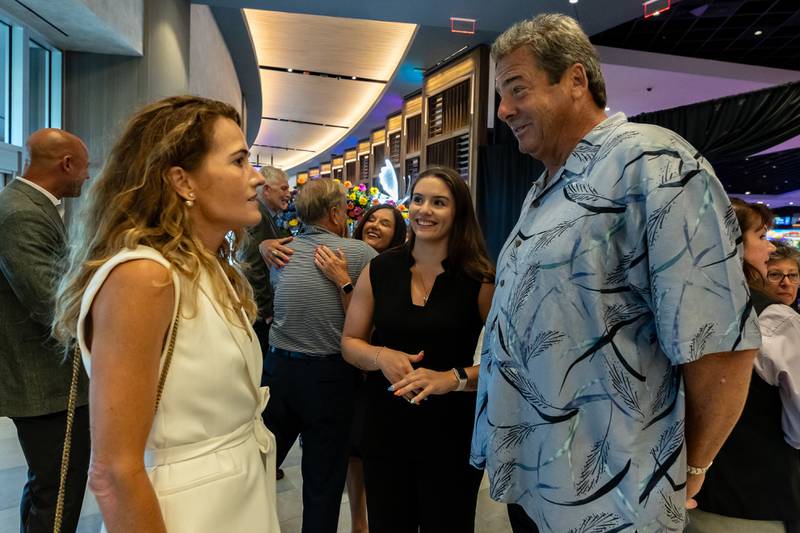 Kathleen Brill, Zofia Lettew, and Rick Lettew, all from Cullinan Properties – the developer who worked with Hollywood Casino Joliet, chat after the Grand Opening Ceremony on Aug. 11, 2025.