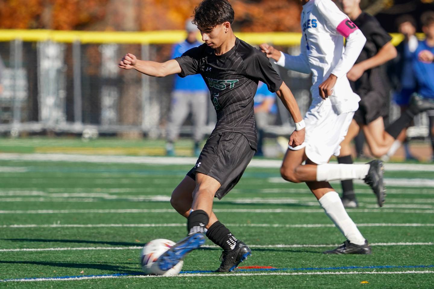 Glenbard West's Harrison Olechowski (6) plays the ball during a class 3A Glenbard West Regional final soccer match at Glenbard West High School in Glen Ellyn on Saturday, Oct. 26, 2024.