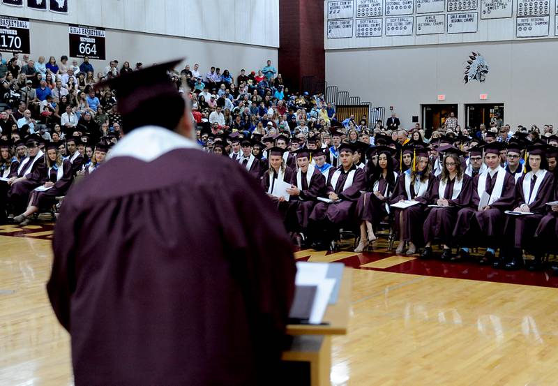 Graduates listen to Class President Juan Zarate Mendoza speak to the graduating class Sunday June 5, 2022, during the Marengo Community High School Graduation Ceremony at the school in Marengo.