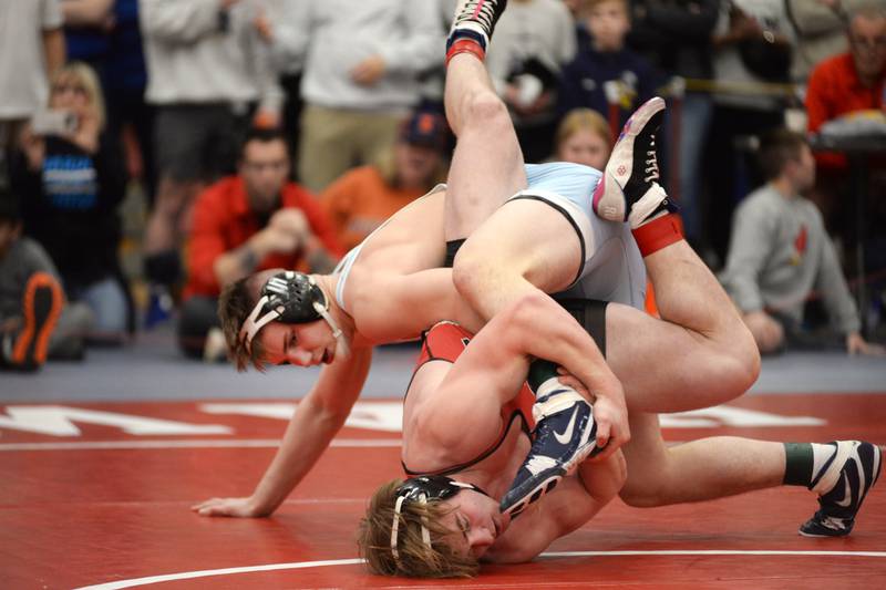 Woodstock Marian’s Jimmy Mastny (top) puts a move on Orion’s Maddux Anderson as they wrestle at 190 pounds at the 1A Oregon Sectional on Saturday, Feb. 15, 2025.