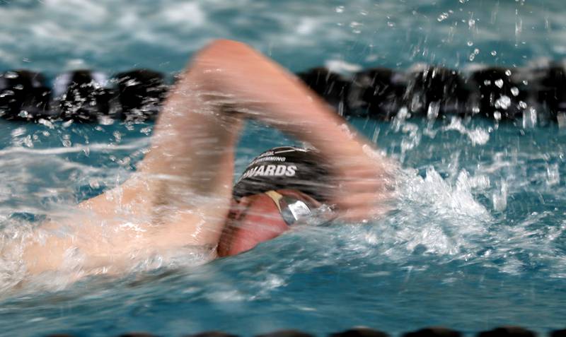 Cary-Grove’s Charlie Edwards competes in the 500 freestyle during the Fox Valley Conference Invitational swim meet on Saturday,  Feb. 15, 2025, at Woodstock North High School.