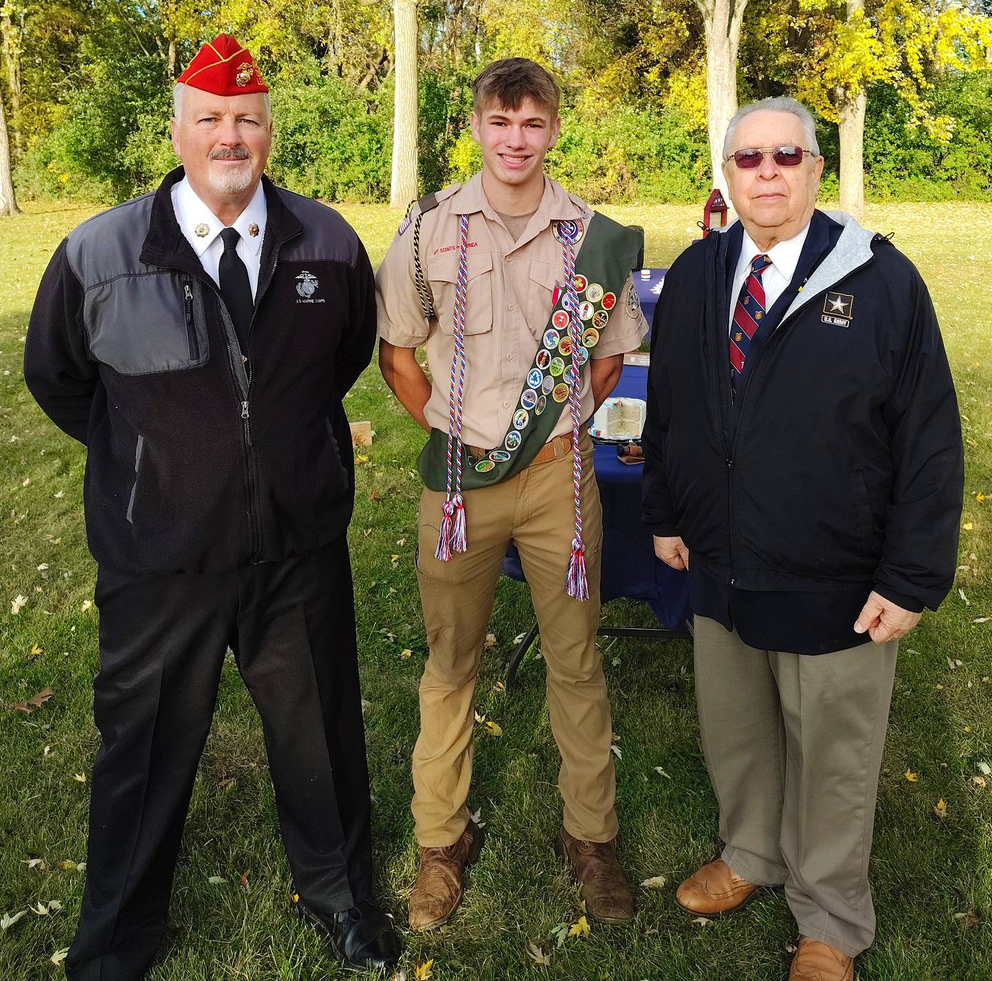 Bruce Johnson (from left), representing the Lake County U.S. Marine Corps League; Ayden Marsek; and Eliseo Lopez, commander of the Chicago chapter of MOWW, at Marsek's Court of Honor event in Island Lake.