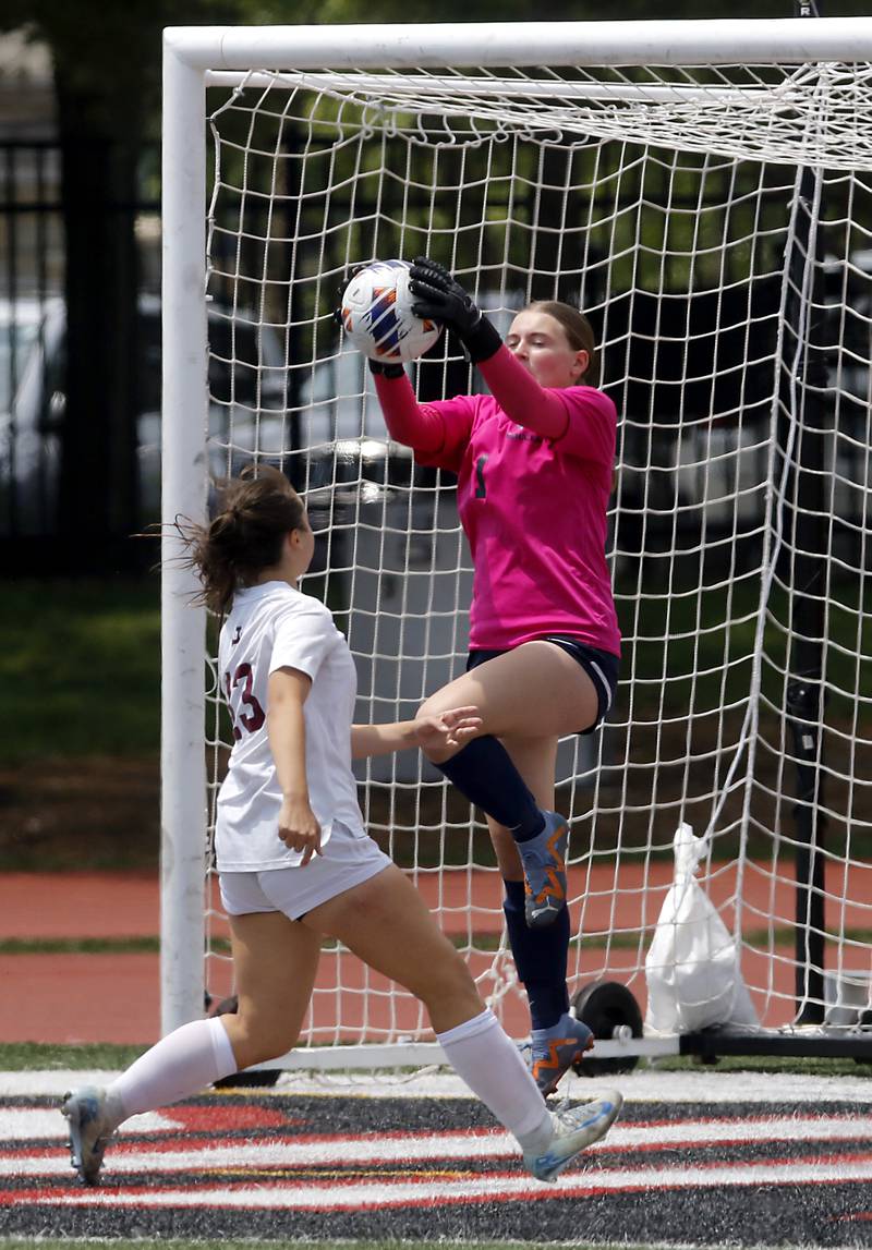 Nazareth Academy's Ana Djurasovic grabs the ball in front of St. Ignatius College Prep's Lili Garcia during a IHSA Class 2A State Girls Soccer semifinal match on Friday, June 6, 2025, at North Central College in Naperville.