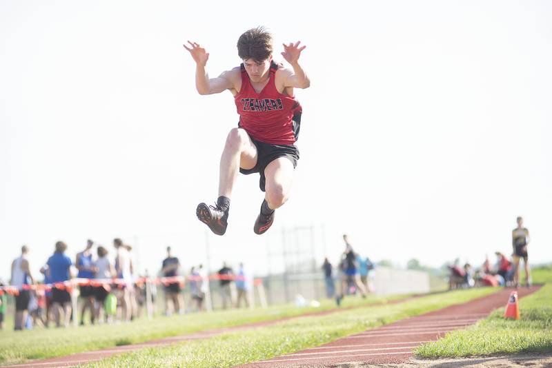 Erie's Caleb Eads competes in the triple jump at the class 1A Erie track sectionals on Thursday, May 19, 2022.