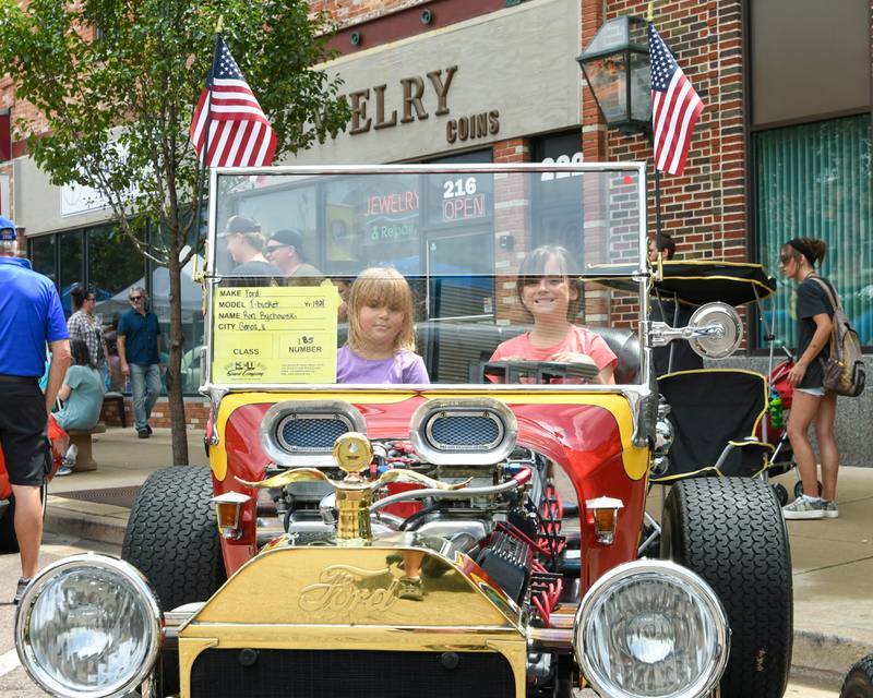 Brynlee Jones, 4, and Paisley Jones, 7, of DeKalb sit in a 1924 Ford T-bucket during the 24th annual Fizz Ehrler Memorial Turning Back Time Car Show held in downtown Sycamore on Sunday, July 28, 2024.