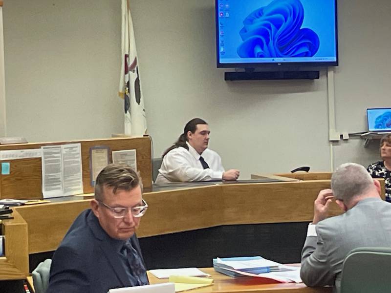 Bradley French (center) testifies Aug. 16, 2023, in La Salle County Circuit Court that he did kill Joshua Scaman, killing him, but that he did so in self-defense. In the foreground, Assistant La Salle County state's attorneys Jeremiah Adams (left) and Matt Kidder prepare their cross-examination of French.