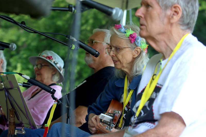 Members of the Fox Valley Folklore Society perform during the Fox Valley Folk Music & Storytelling Festival at Wheeler Park in Geneva on Sunday, August 31, 2025.