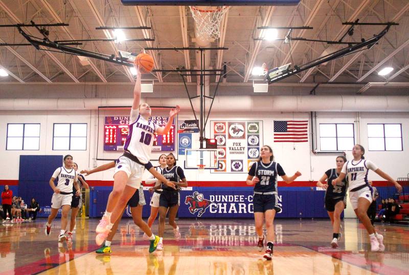 Hampshire’s Peyton McCarthy makes a layup against South Elgin in varsity girls basketball Komaromy Classic tournament  action on Monday, Dec. 29, 2025, at Dundee-Crown High School in Carpentersville.