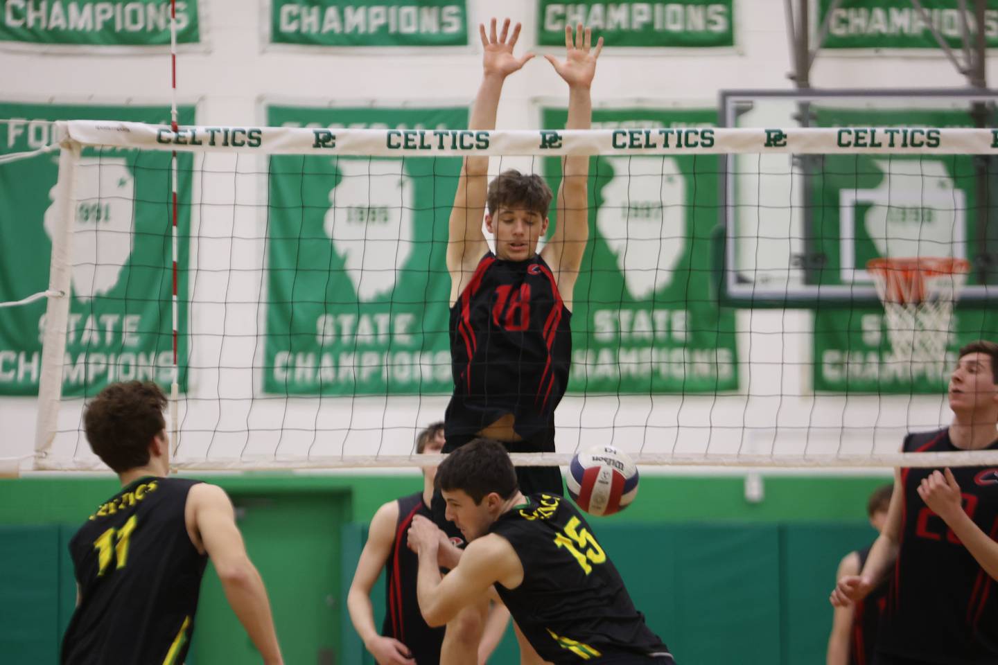 Lincoln-Way Central’s Iain Hillegass goes for the block on a botched play by Providence. Monday, April 18, 2022, in New Lenox.