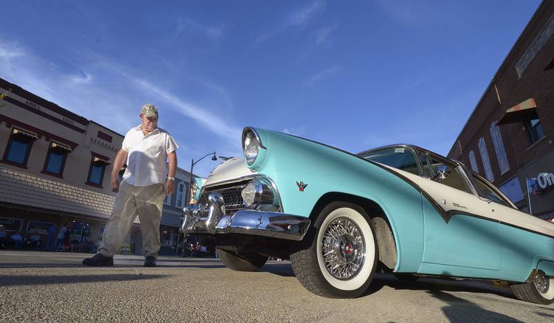 This Ford Fairlane Crown Victoria caught the eye of many as the evening sun set upon it parked on Main St during the annual Cruise Night Saturday in Streator.  Hosted by Dream Machines Car Club,