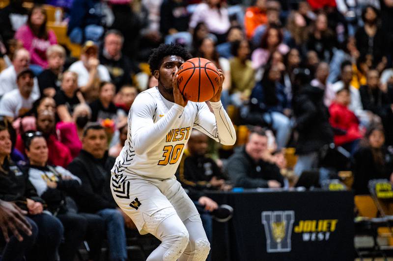 Joliet West's Jeremiah Purchase lines up a shot during a game against Plainfield South Tuesday Feb. 14, 2023 at Joliet West  High School