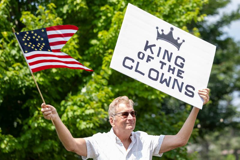Protester holds sign at the “No Kings” protest on Saturday, June 14, 2025 at Rotary Park in Princeton.