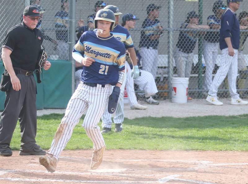 Marquette's Easton DeBernadi scores a run against St. Bede on Thursday, April 24, 2025 at St. Bede Academy.
