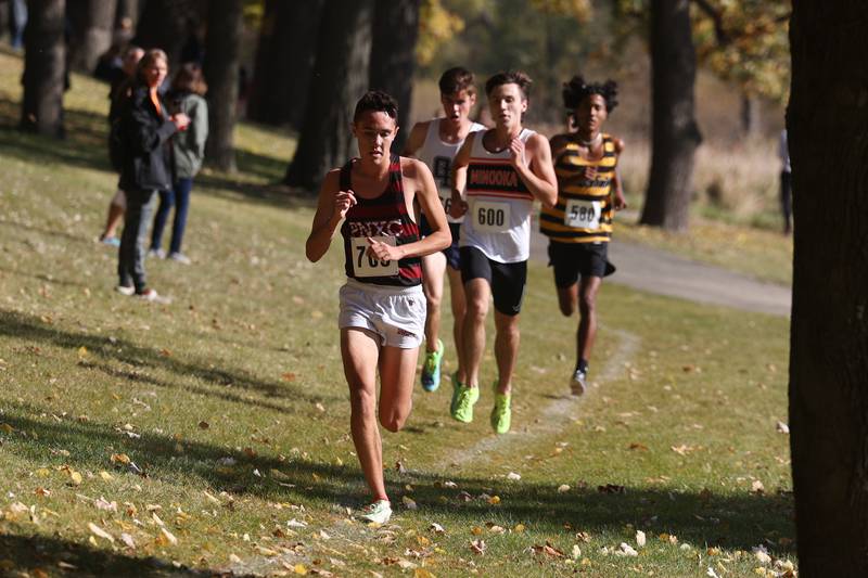 Plainfield North’s Oliver Burns holds the lead near midway in the Boys Cross Country Class 3A Minooka Regional at Channahon Community Park on Saturday.