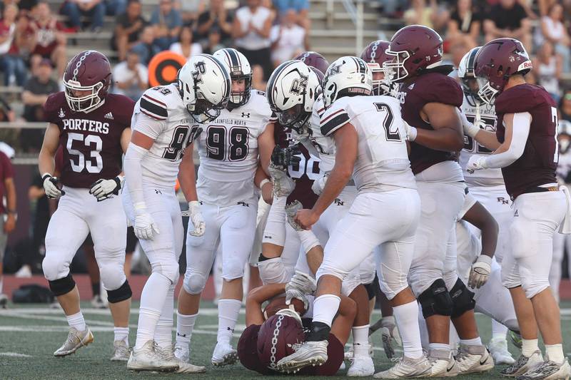 Plainfield North’s stands over the Lockport runner after a tackel for a loss on Friday, August 30, 2024 in Lockport.