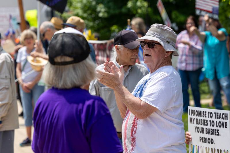 Protester claps at the “No Kings” protest on Saturday, June 14, 2025 at Rotary Park in Princeton.