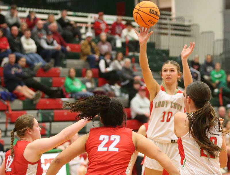 L-P's Kelsey Frederick shoots a jup shot over Streator defenders Leah Krohe and Alexis Thomas on Tuesday, Jan. 28, 2025 in Sellett Gymnasium at L-P High School.