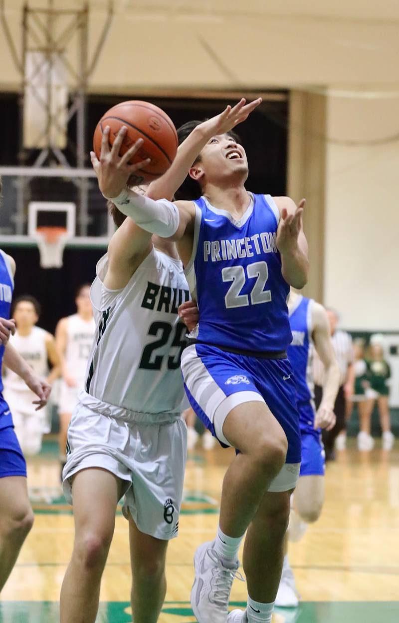 Princeton's Christian Rosario gets a helping hand from St. Bede's Logan Potthoff Friday night.