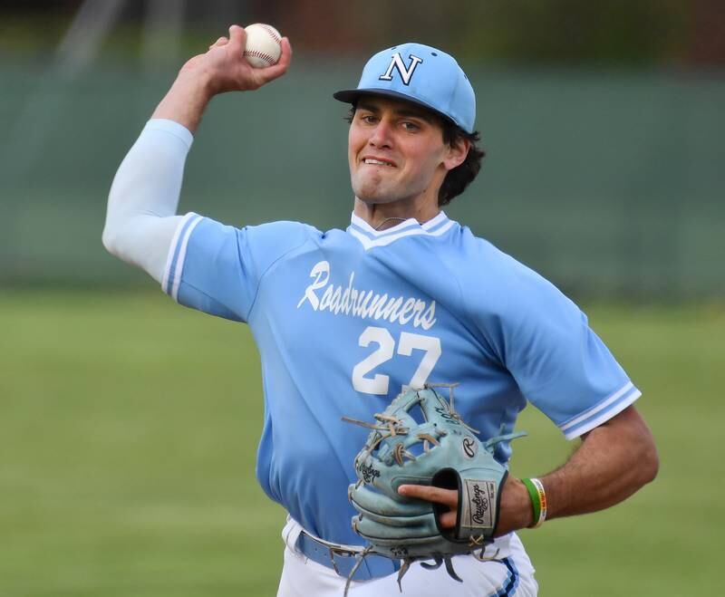 Nazareth pitcher David Cox delivers to a Benet batter during a game in April 2024 at Benet Academy in Lisle.