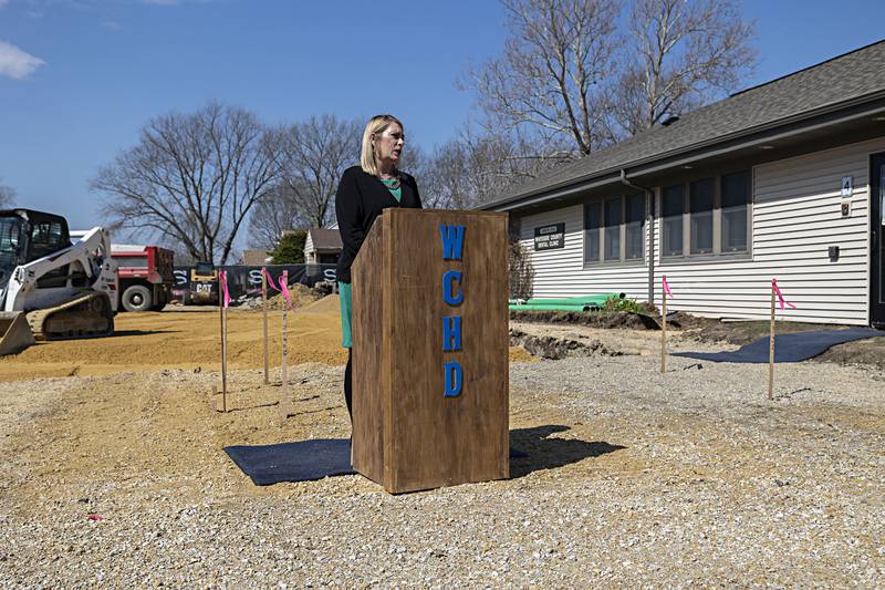 Whiteside County Health Department director Cheryl Lee greets visitors to a groundbreaking for an expansion of services in Rock Falls Thursday, March 28, 2024.