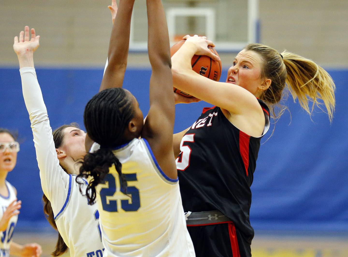 Benet's Lenee Beaumont (5) goes up against Lyons' defense during the girls varsity basketball game between Benet Academy and Lyons Township on Wednesday, Nov. 30, 2022 in LaGrange, IL.