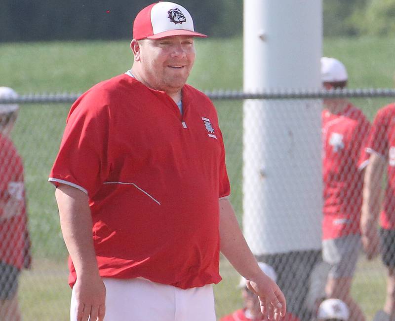 Streator head baseball coach Beau Albert smiles while coaching his team during the Class 3A Sectional semifinal game against Richwoods on Wednesday, May 31, 2023 at Metamora High School.