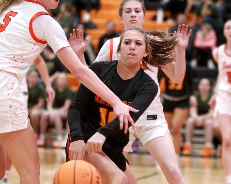 Batavia’s Payton Haslett passes the ball during a game against St. Charles East on Wednesday, Jan. 8, 2025 in St. Charles.