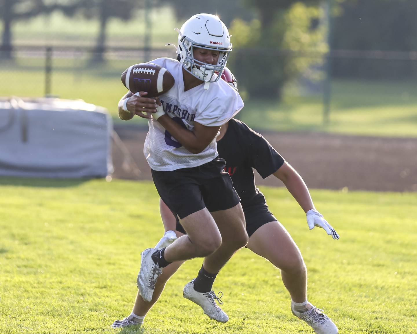 Hampshire's Chris Whetstone attempts a reception during the Kaneland 7 on 7 football tournament, July 22, 2025 in Maple Park.