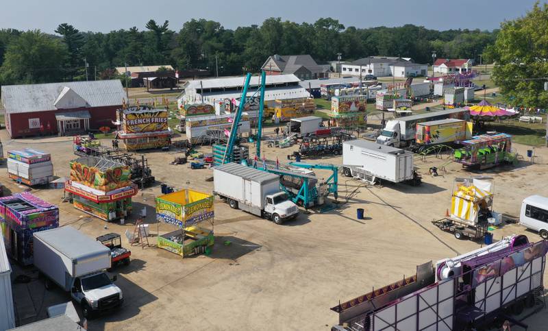 An aerial view of carnival workers setting up the 168th annual Bureau County Fair on Tuesday, Aug. 22, 2023 in Princeton. The fair runs Wednesday through Sunday.