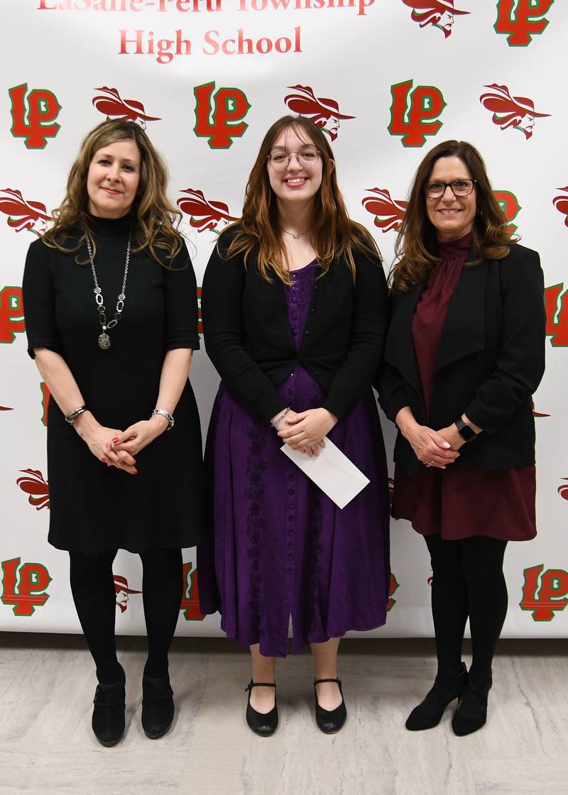 Zoe Kidd (middle) received the 2023 Georgia Stohr Award at La Salle-Peru High School.