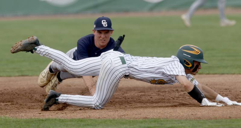 Cary-Grove's Peyton Seaburg tags out Crystal Lake South's Christian Alther as he dives back to second base during the IHSA Class 3A Grayslake Central Sectional Championship baseball game on Saturday, June 7, 2025, at Grayslake Central High School.