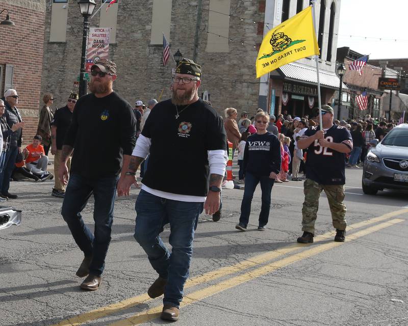 Ottawa VFW Post 2470 Veterans march during the 16th annual Utica Veterans Parade and Air Show on Sunday Nov. 5, 2023 downtown Utica.