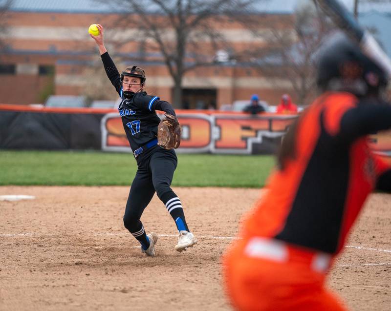 St. Charles North's Ava Goettel (17) delivers a pitch against against St. Charles East during a softball game at St. Charles East High School on Monday, April 25, 2022.