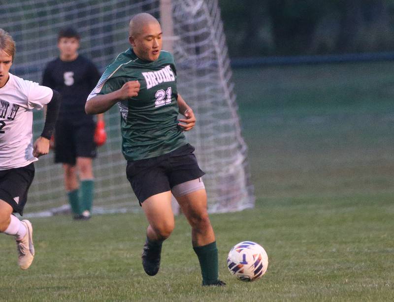 St. Bede's Brax Kim stays with the ball while playing Abingdon-Avon on Wednesday, Oct. 15, 2025 at St. Bede Academy.