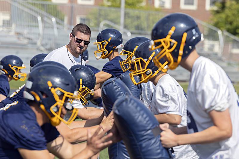 Sterling players run through drills during first day of football practice Monday, August 7, 2023.