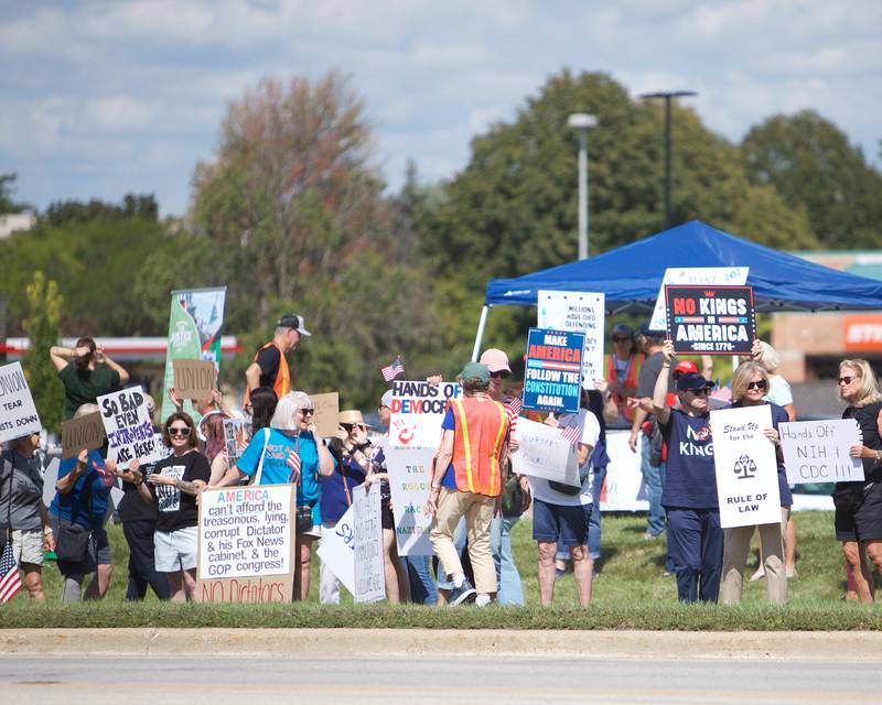 People rally on Labor Day, Sept. 1, 2025, for "Workers over Billionaires" along Route 64 in St. Charles.