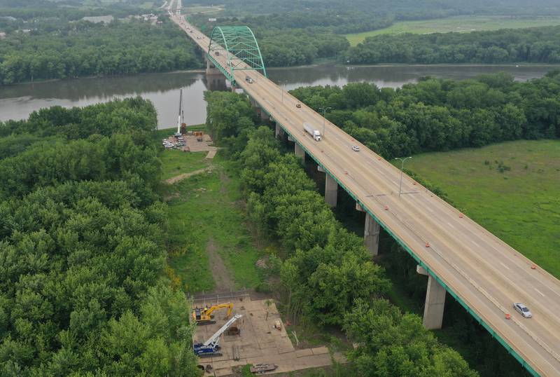 An aerial view of crews working on the Abraham Lincoln Memorial Bridge crossing the Illinois River near La Salle.  Work will maintain the bridge expansion joints. The project will begin in the southbound lanes and one lane of traffic will be open. Work will later shift to the northbound lanes. The $1.3 million project is expected to be completed by the end of July.