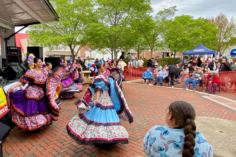 Dancers with Northern Illinois University's Ballet Folklórico Aztlán perform for the crowd on Sunday, May 4, 2025, in the Frank Van Buer Plaza in downtown DeKalb for the city's annual Cinco de Mayo Celebration.