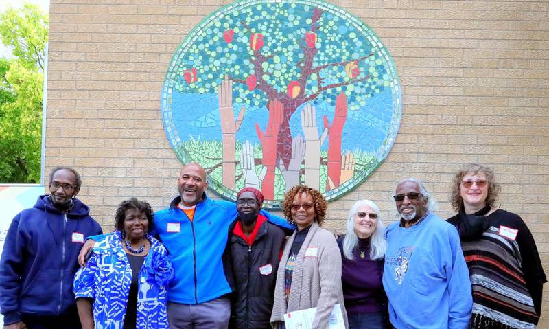CDG Arts Committee members in front of the Diversity Fruit Tree panel at the Dedication Celebration on Oct. 15, 2023.