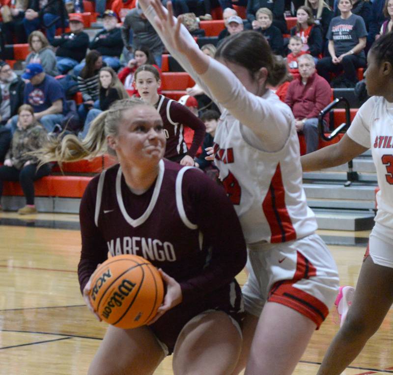 Marengo's Mia Feidt (21) makes a move to the basket as Stillman Valley's Brooke Jordal (34) defends at the 2A Stillman Valley Regional on Monday, Feb. 17, 2025 at Stillman Valley High School.