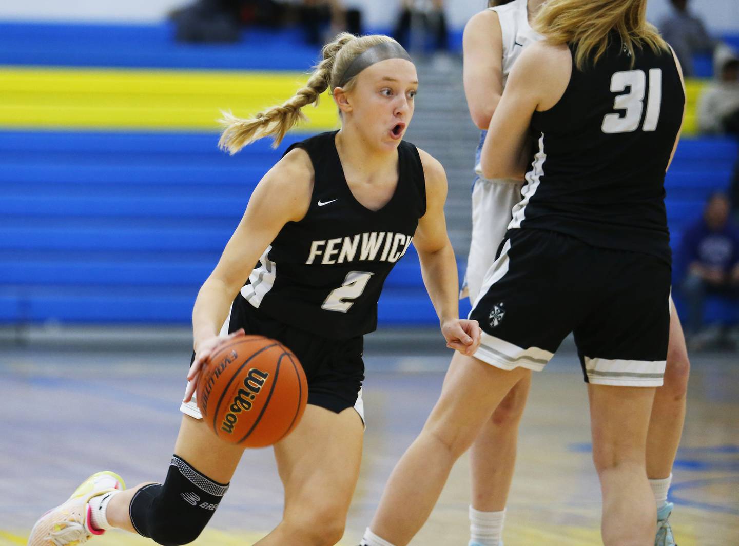 Fenwick's Mia Caccitolo drives to the basket during the girls IHSA 3A Supersectional basketball game between Nazareth Academy and Fenwick High School on Monday, February 28, 2022 at De La Salle High School in Chicago.