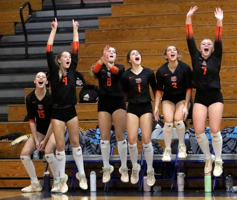 Crystal Lake Central’s Tigers get revved up during a two-set win over Woodstock North in IHSA girls volleyball Class 3A Regional Championship action at Woodstock High School in Woodstock on Thursday, October 30, 2025.