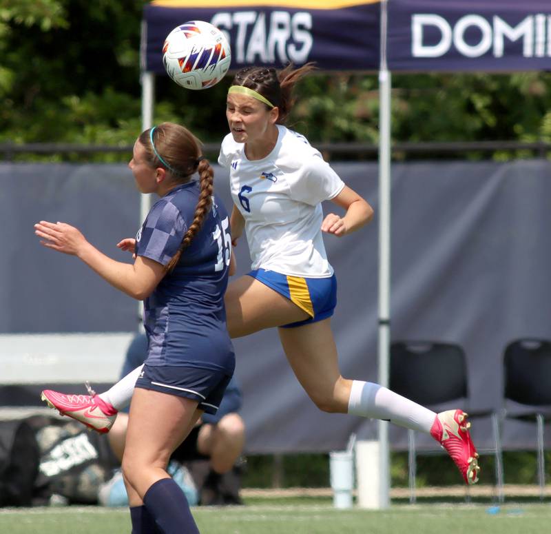 Johnsburg’s Liz Smith, back, rushes to the ball with Willows Academy’s Sophia Duffy in IHSA Class 1A Supersectional soccer action at Dominican University in River Forest on Saturday, May 31, 2025.