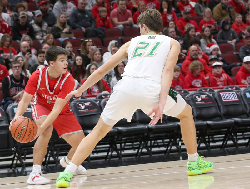 Streator's Logan Aukland looks to pass the ball around Seneca's Lane Provance during a game on Tuesday, Dec. 21, 2023 at the United Center in Chicago.