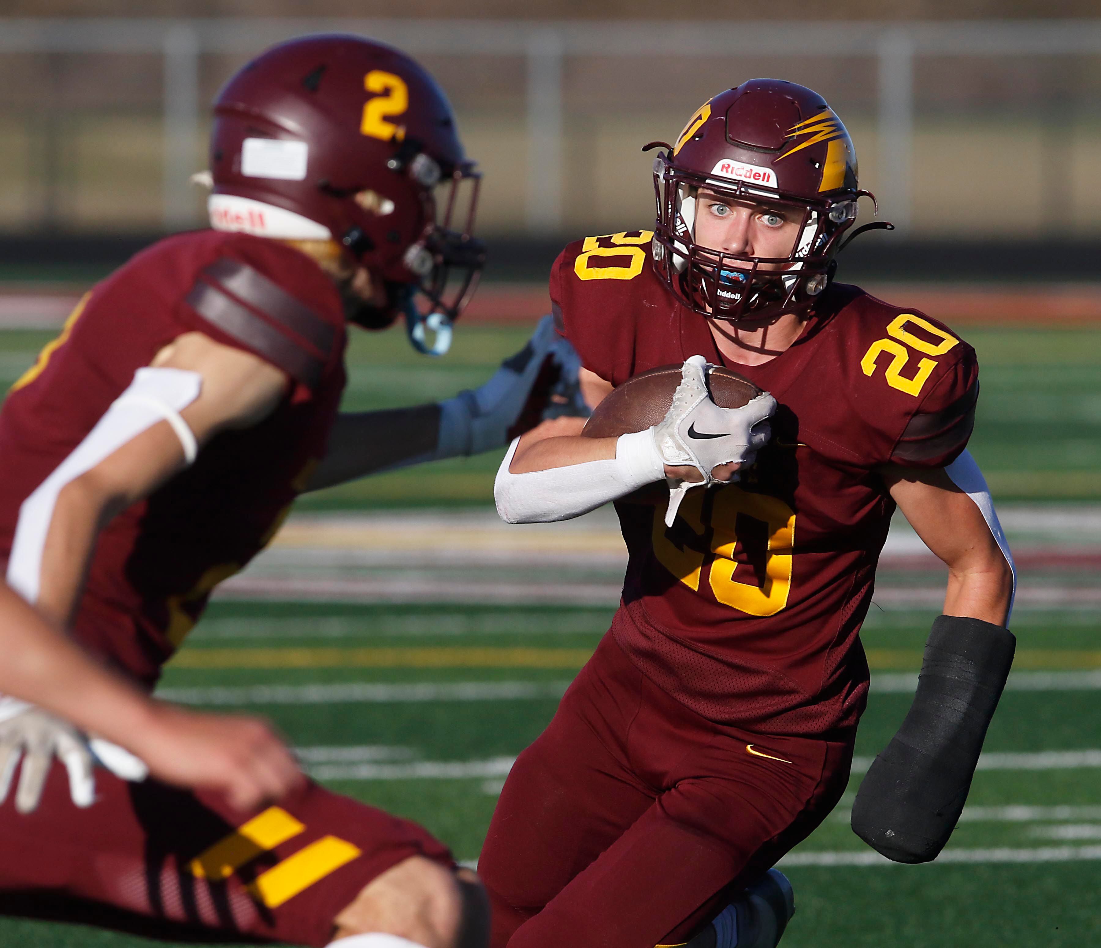 Richmond-Burton's Luke Johnson runs with the ball during an IHSA Class 3A quarterfinal playoff football game against Monmouth-Roseville on Saturday, November 15, 2025, at Richmond-Burton High School, in Richmond.