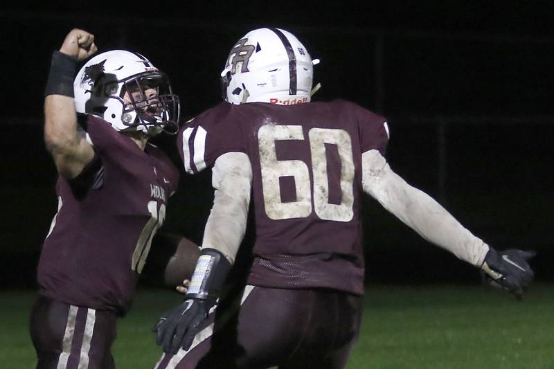 Prairie Ridge's Dominic Creatore and Fernando Rodriguez celebrate a touchdown during a Fox Valley Conference football game against Crystal Lake Central  on Friday, Oct. 13, 2023, at Prairie Ridge High School in Crystal Lake.