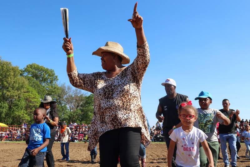 Toni Cleaves, of Kankakee, joins in the line-dancing during a break action at the 50th Pembroke Rodeo on Sunday, May 24, 2026. Cleaves said she has attended the Pembroke Rodeo for all 50 years.