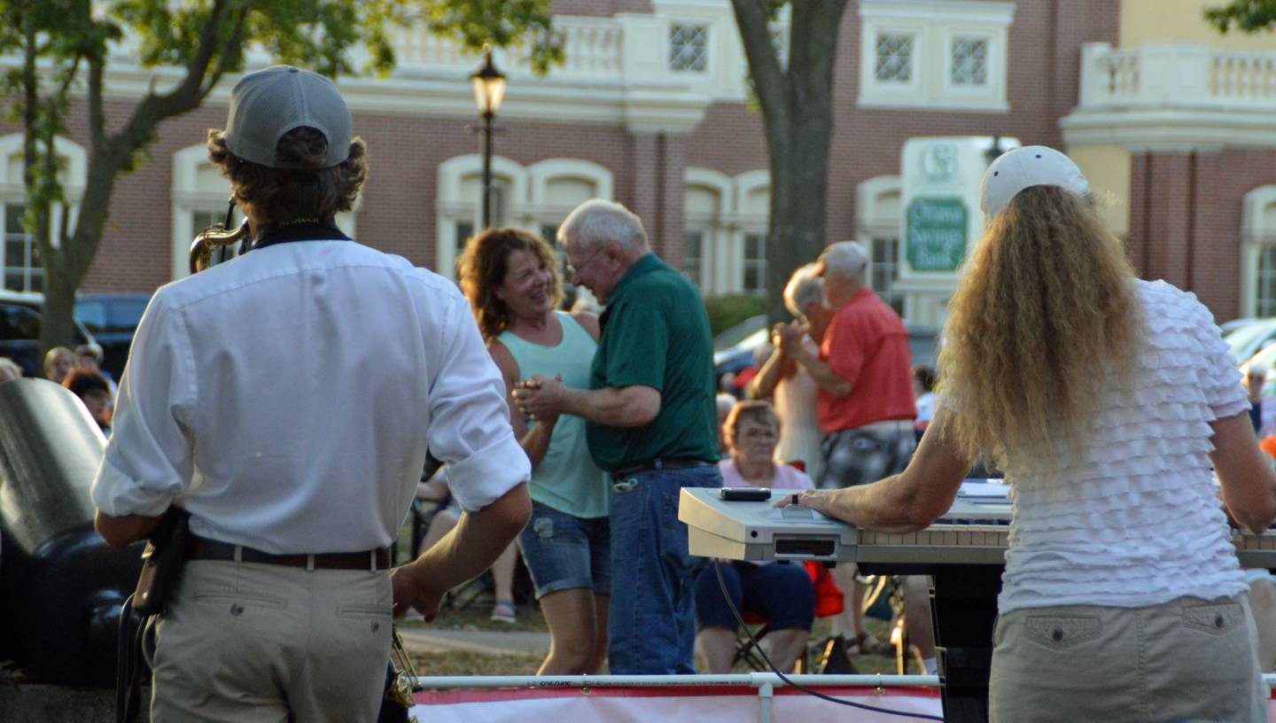 Dancers enjoy the Music in the Park series at Ottawa's Washington Square. The concert series returns for its largest series.