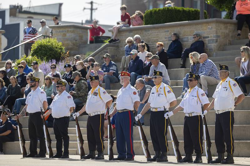 An honor guard stands at attention Monday, May 26, 2025, during a ceremony at the Dixon riverfront in recognition of Memorial Day.